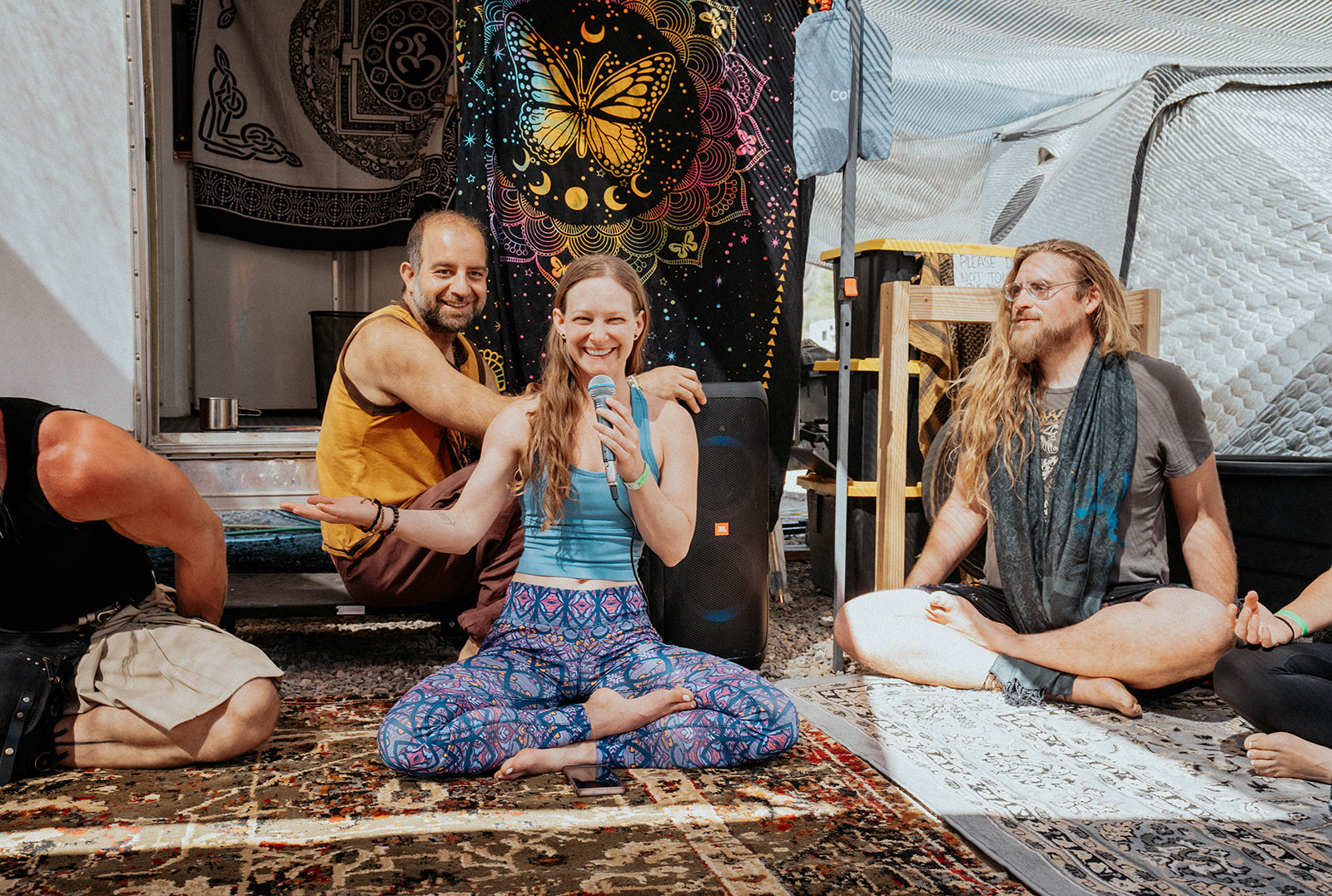 A guided meditation session taking place at ResonantVibe’s activation during Convergence Wellness Festival at Tico Time River Resort.