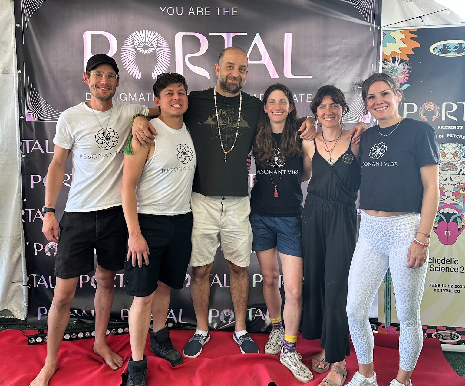 The ResonantVibe team posing together at the PORTAL Dome during the MAPS Psychedelic Science Conference in Denver after offering VAVE™ Multisensory Resonant Frequency Therapy demo sessions.