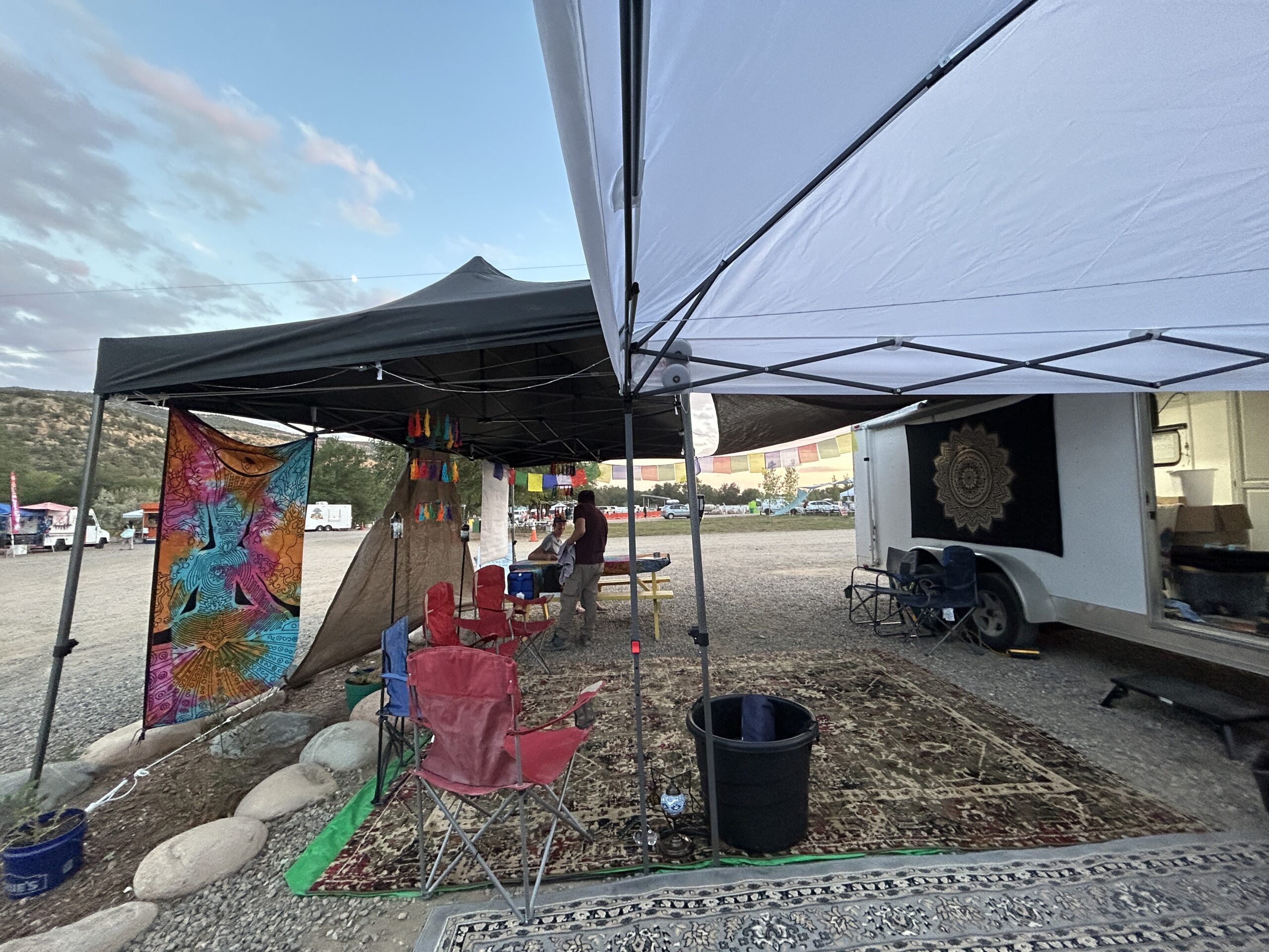 ResonantVibe activation setup at Convergence Wellness Festival featuring tents and lounge space at Tico Time River Resort in Colorado.