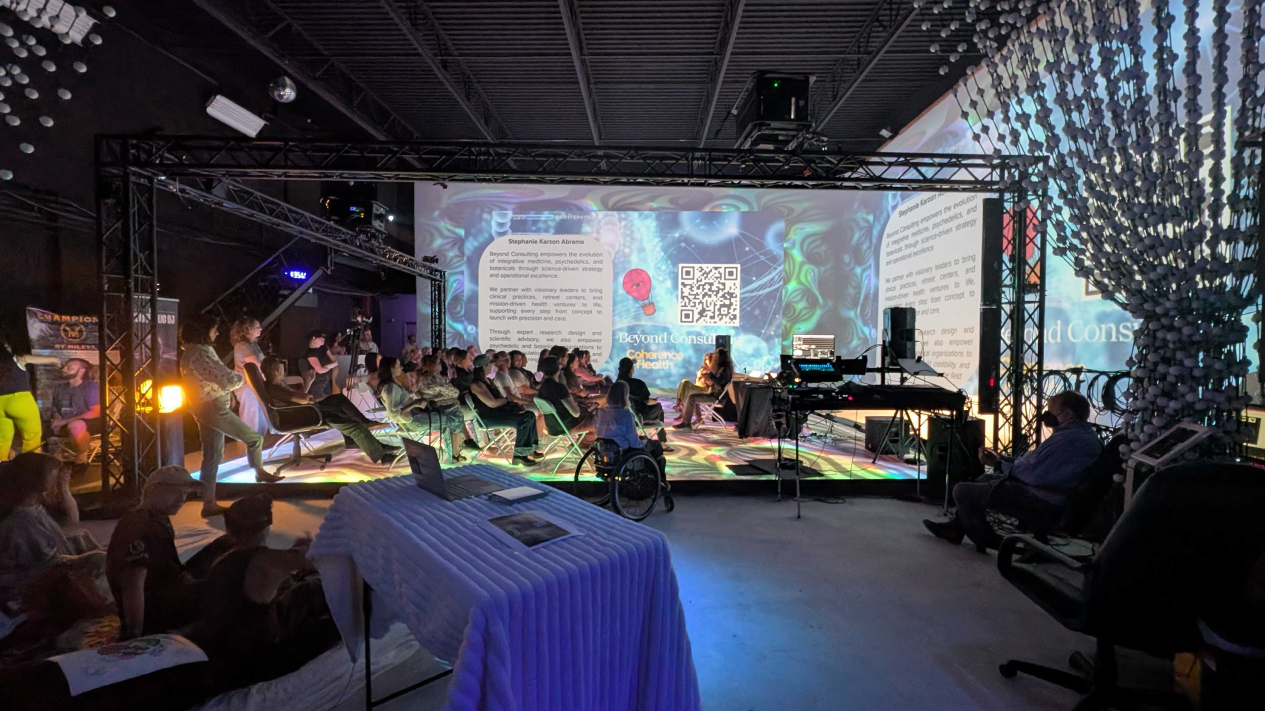 Audience members attending a presentation at the Coherence X Health event focused on emerging health technologies in Los Angeles in August 2025.