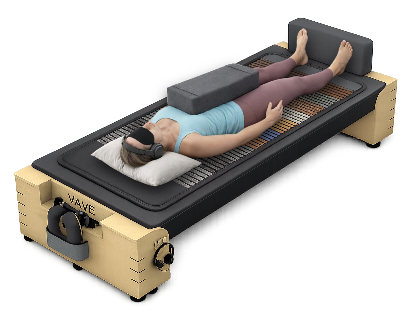 Woman lying on a VAVE™ Multisensory Resonant Frequency Therapy bed experiencing immersive sound and vibration therapy.